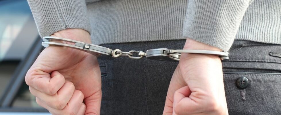 arrest handcuffs binary options