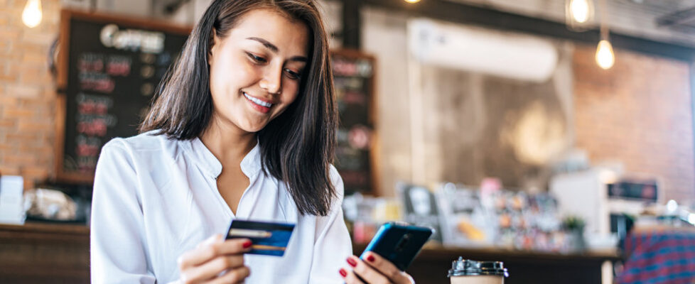 Pay for goods by credit card through a smartphone in a coffee sh